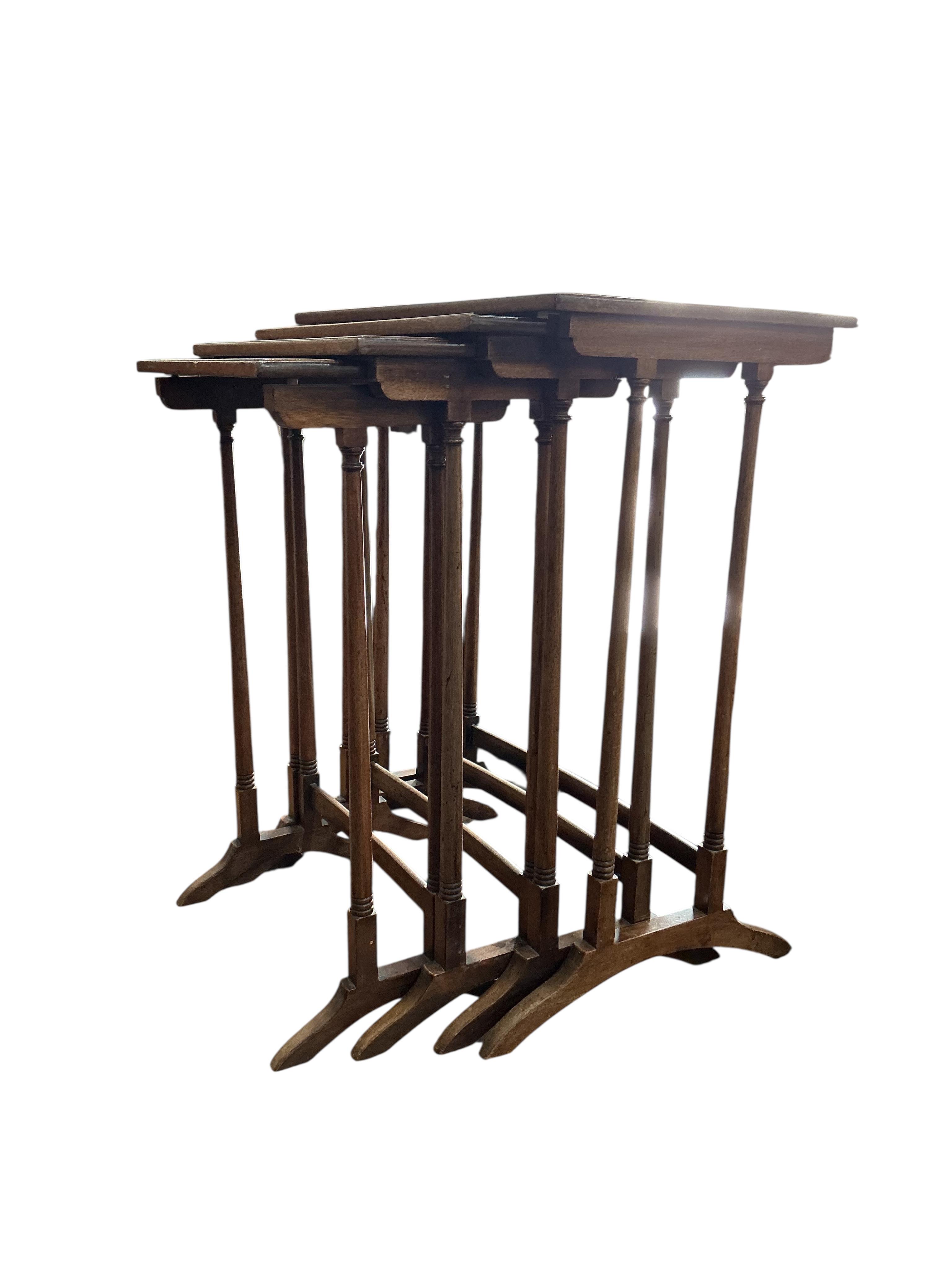 A quartetto of Edwardian rectangular mahogany tables, width 53cm, depth 36cm, height 70cm together with a George III style mahogany toilet mirror